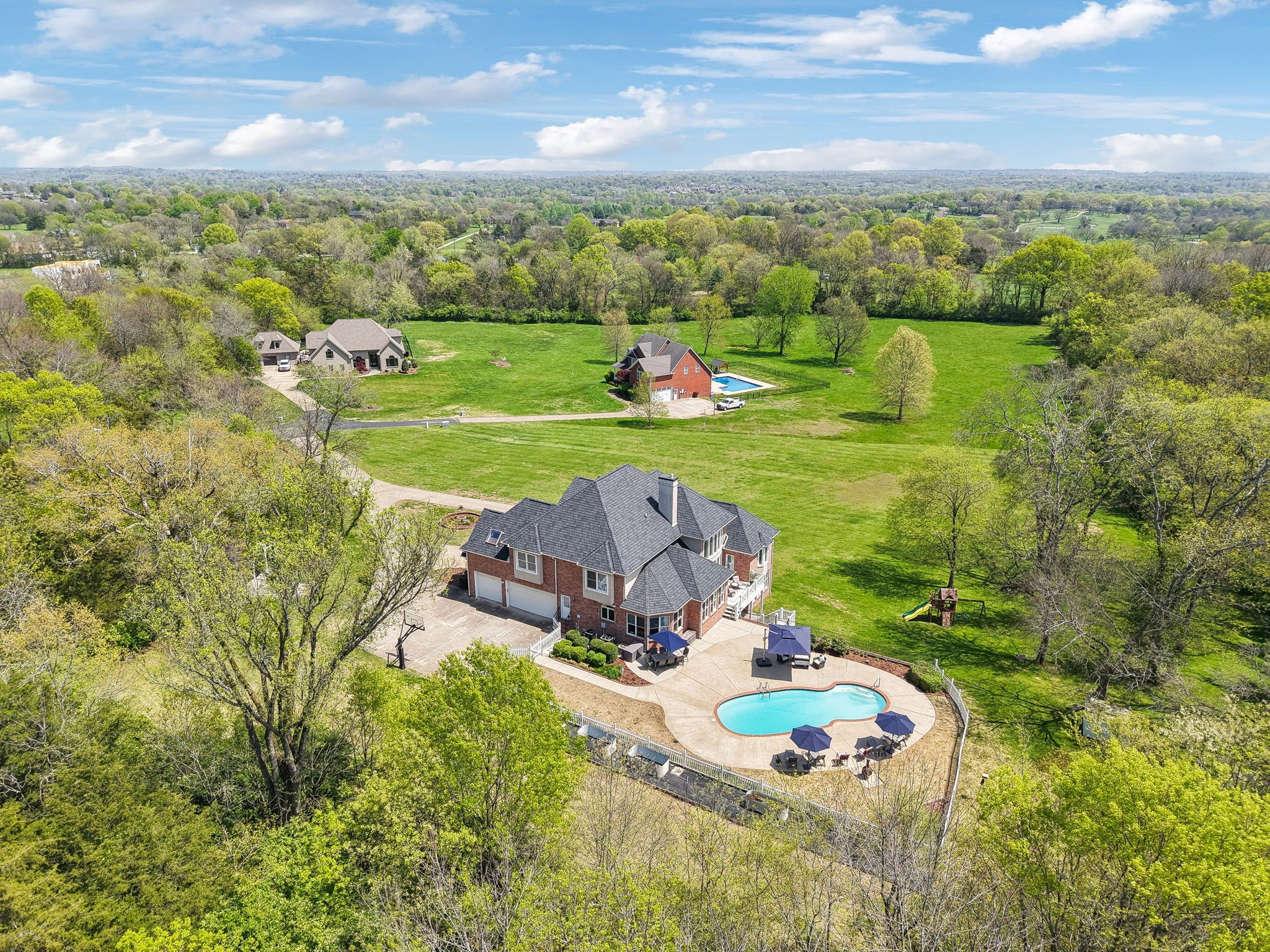 1546 Hudson Road Madison, TN 37115 - Photo 2 of 77 an aerial view of a golf course with parking space