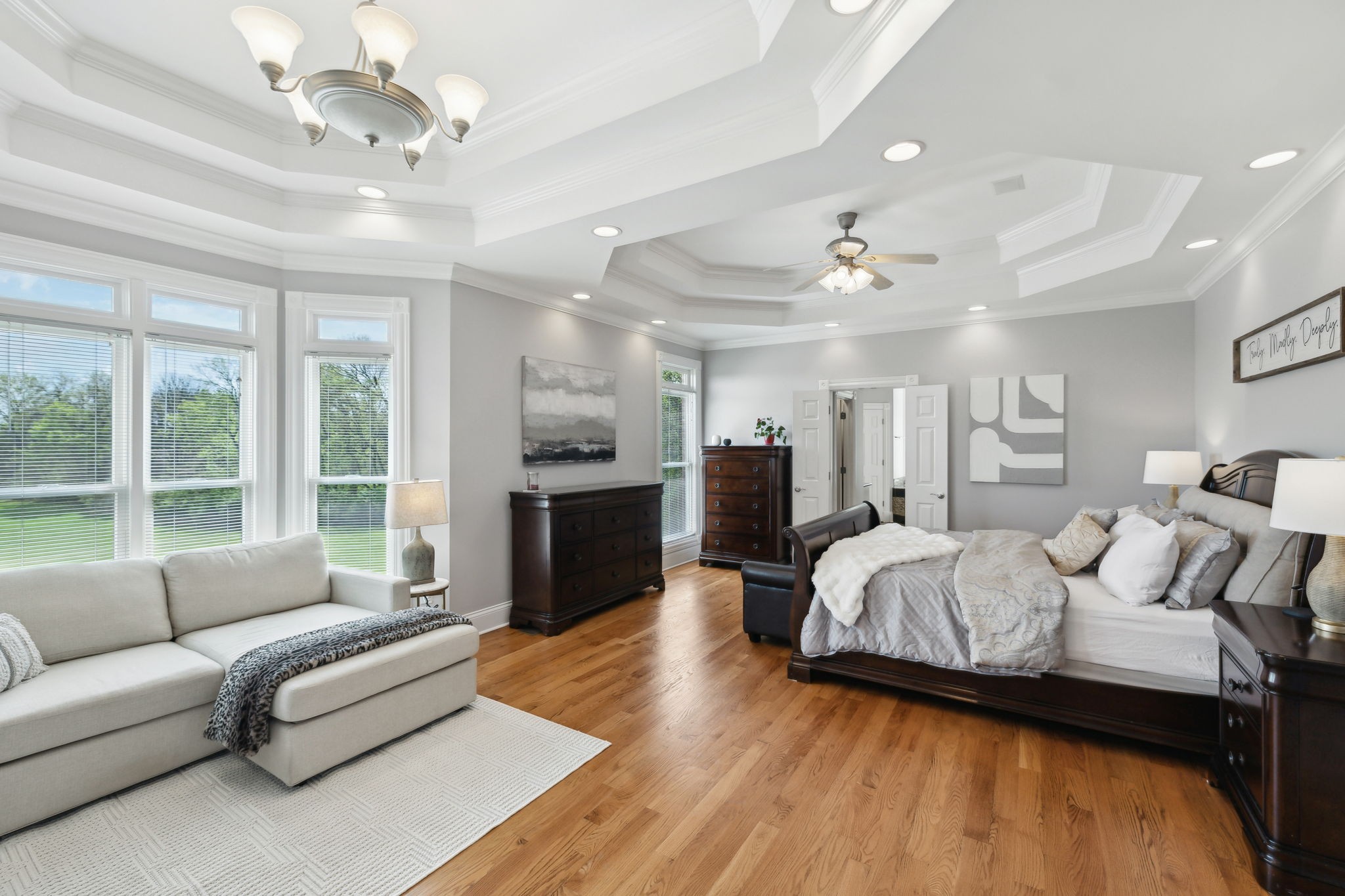 1546 Hudson Road Madison, TN 37115 - Photo 21 of 77 a spacious bedroom with a large bed and a couch