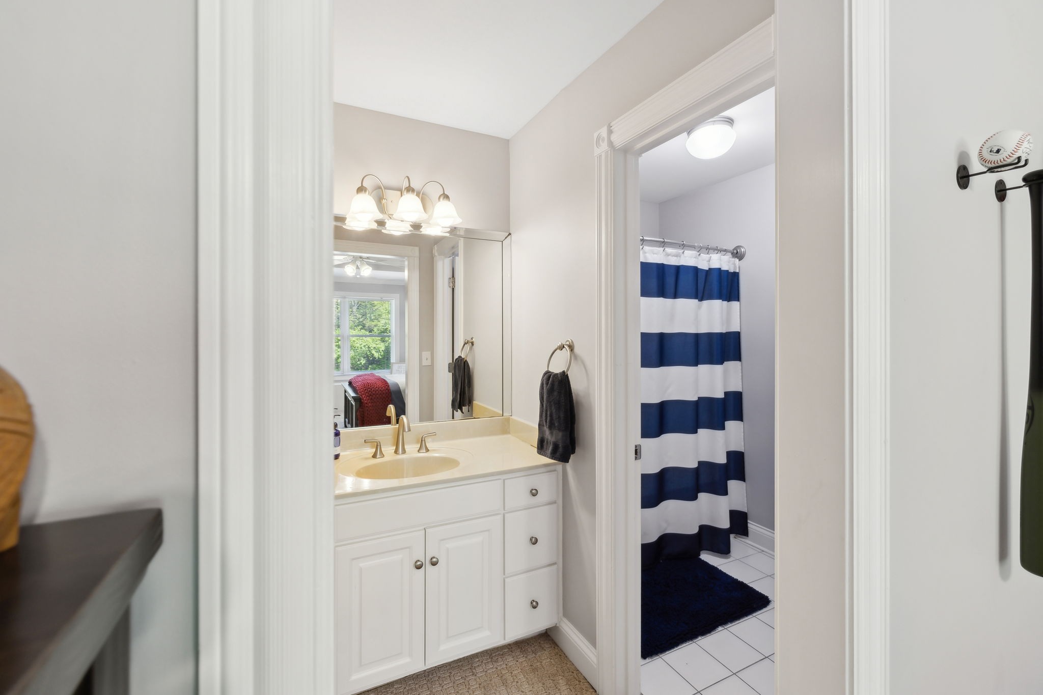 1546 Hudson Road Madison, TN 37115 - Photo 32 of 77 a en suite bathroom with a sink double vanity and a mirror