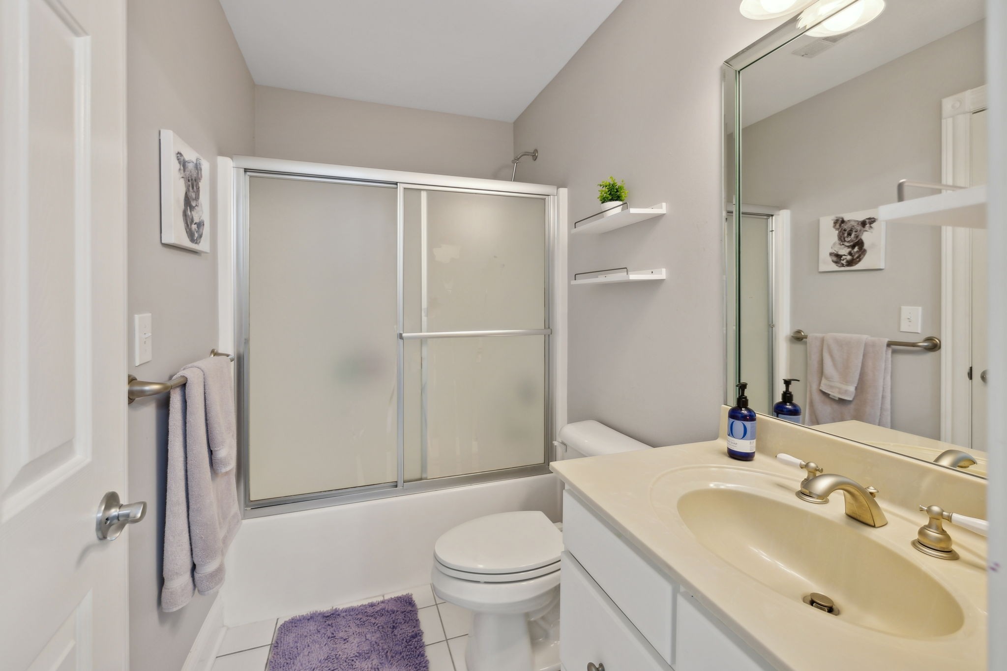 1546 Hudson Road Madison, TN 37115 - Photo 37 of 77 a bathroom with a sink toilet and shower