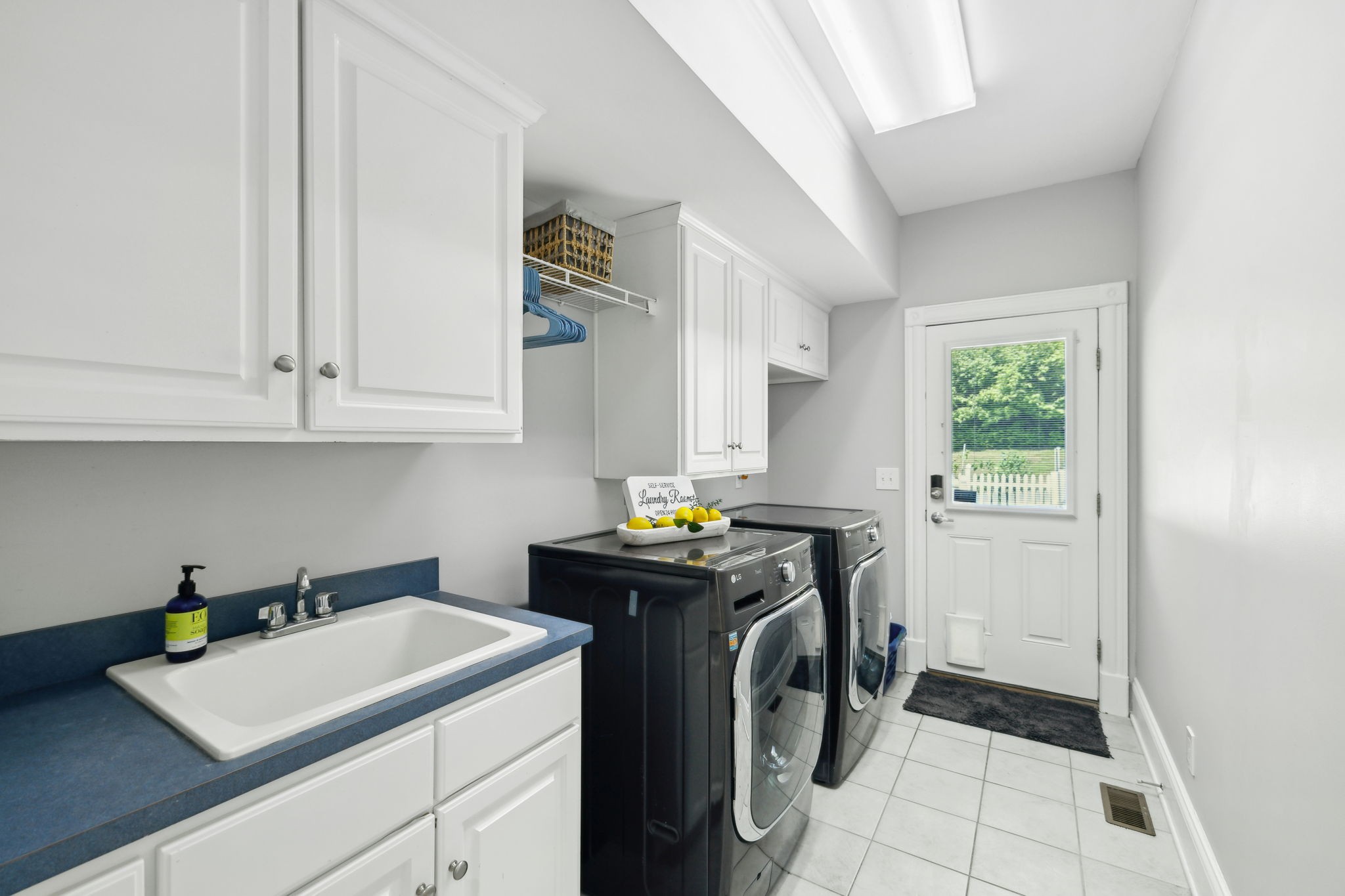 1546 Hudson Road Madison, TN 37115 - Photo 42 of 77 a utility room with closet dryer and washer