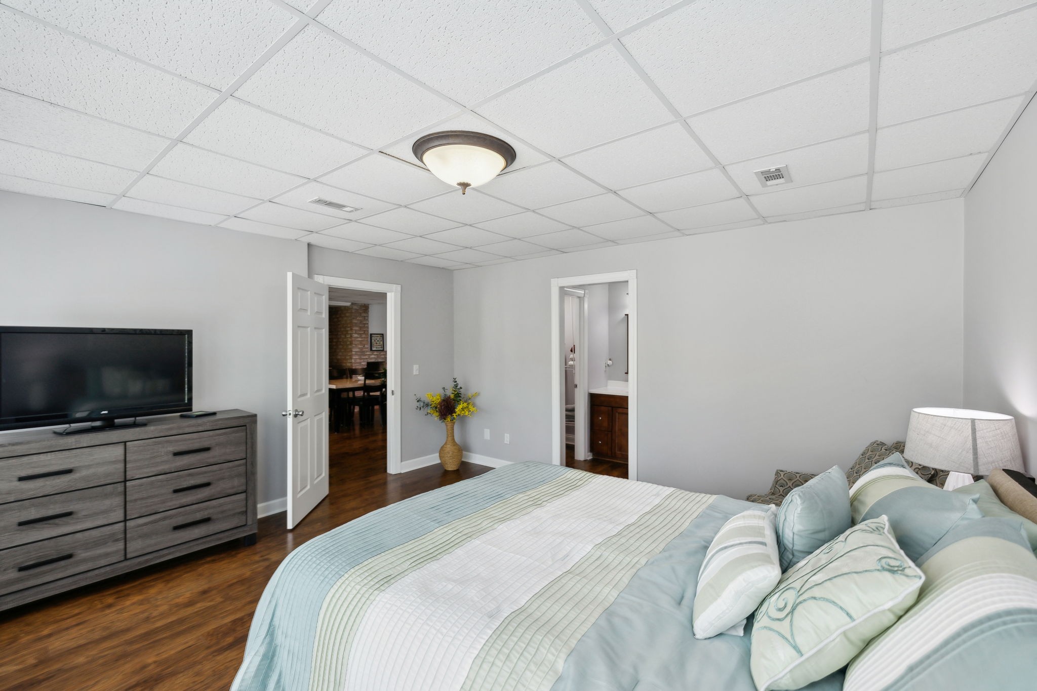 1546 Hudson Road Madison, TN 37115 - Photo 54 of 77 a bedroom with bed and flat screen tv