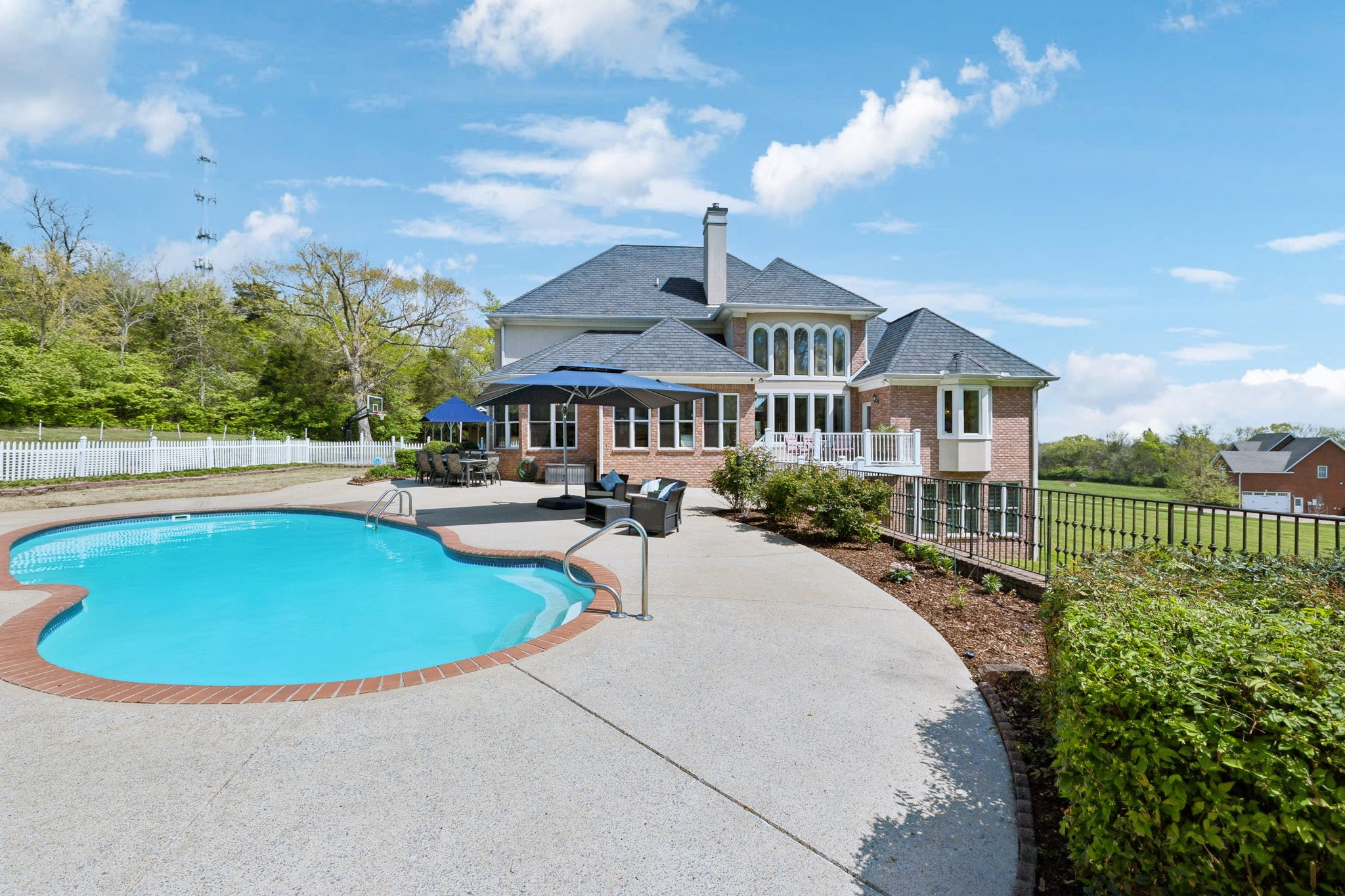 1546 Hudson Road Madison, TN 37115 - Photo 61 of 77 a swimming pool with outdoor seating and yard