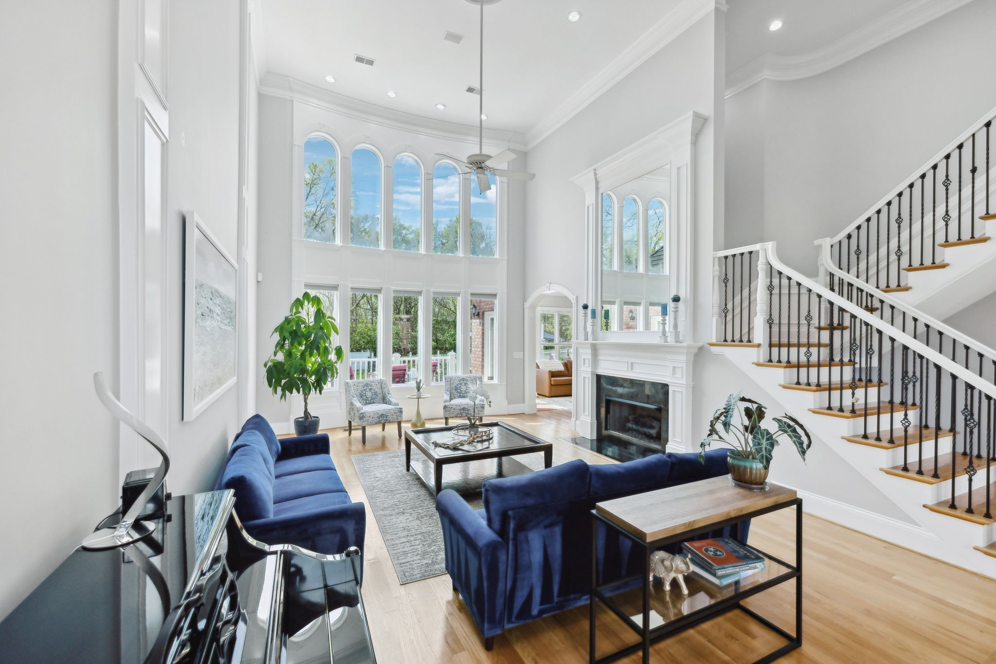 1546 Hudson Road Madison, TN 37115 - Photo 9 of 77 a living room with furniture a fireplace and a chandelier