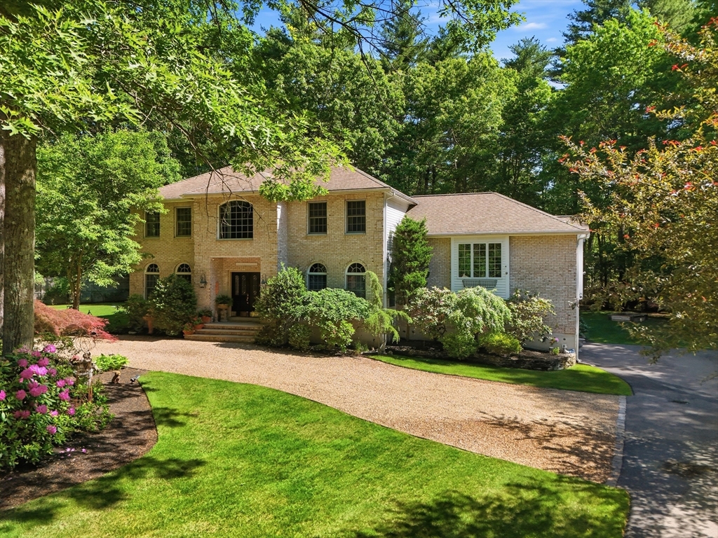 25 Haymeadow Road Boxford, MA 01921 - Photo 1 of 42 a front view of a house with a yard