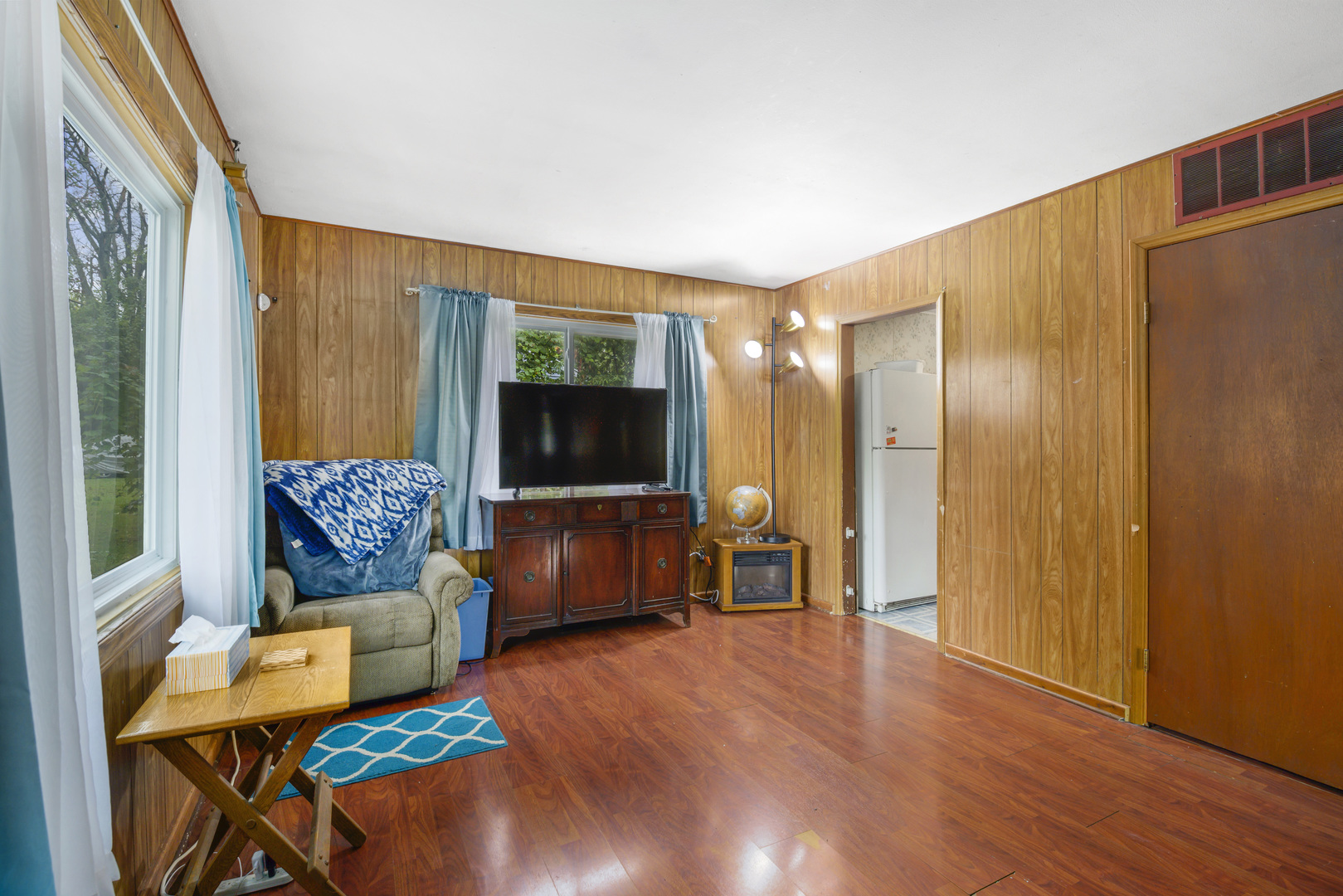 123 Luana Road Joliet, IL 60433 - Photo 9 of 16 a bedroom with furniture and a flat screen tv