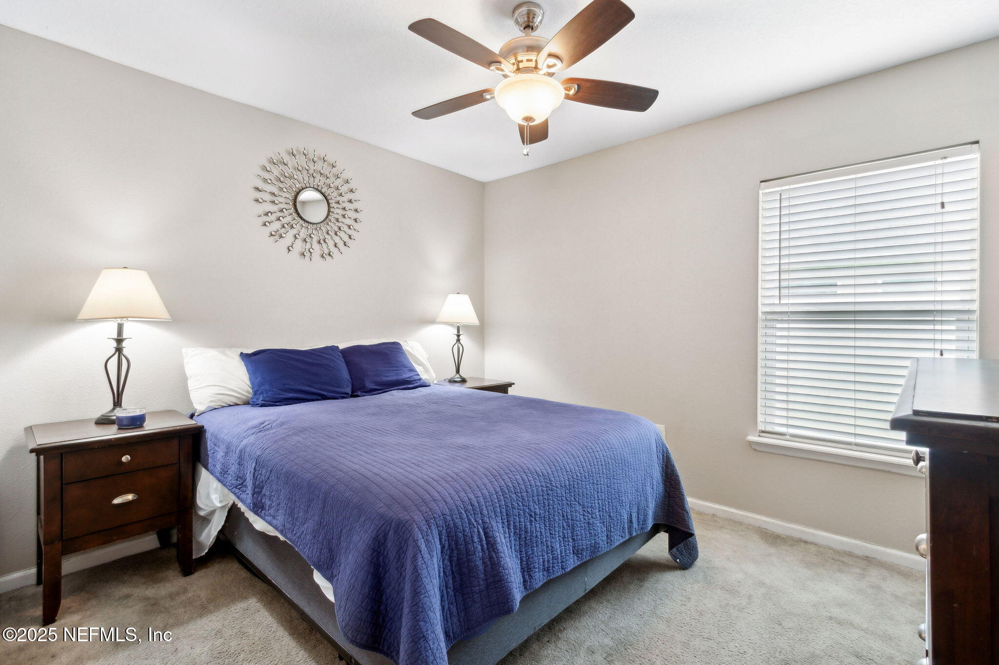 7197 Steventon Way Jacksonville, FL 32244 - Photo 29 of 58 a bedroom with a bed and a window