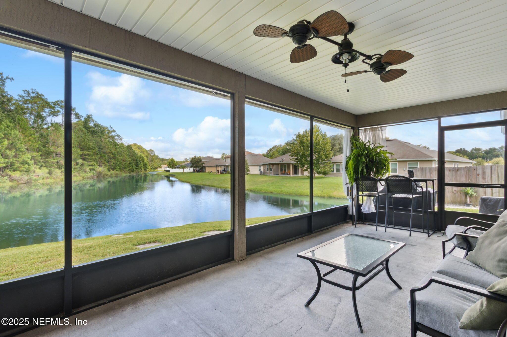 7197 Steventon Way Jacksonville, FL 32244 - Photo 43 of 58 a living room with hardwood floor and balcony