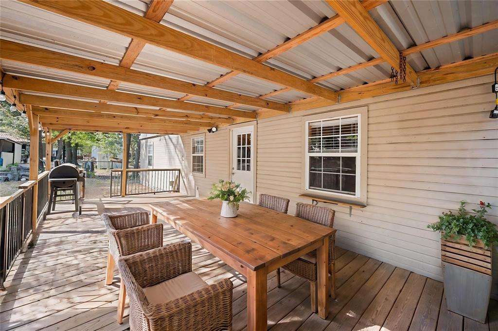 134 Maple Avenue Streetman, TX 75859 - Photo 3 of 19 Wooden deck with outdoor dining area