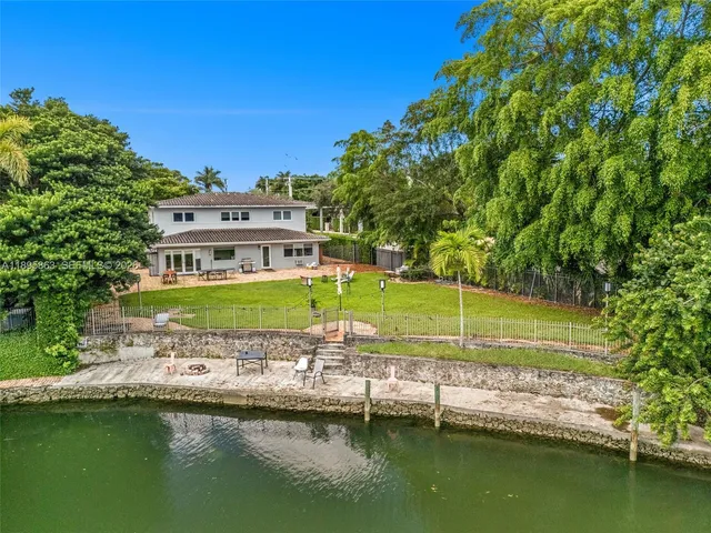 a view of a house with a ocean view