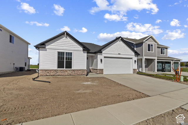 205 East 690th Street North Logan, UT 84321 - Photo 1 of 52 Contemporary single-story residence with white siding and a dark roof