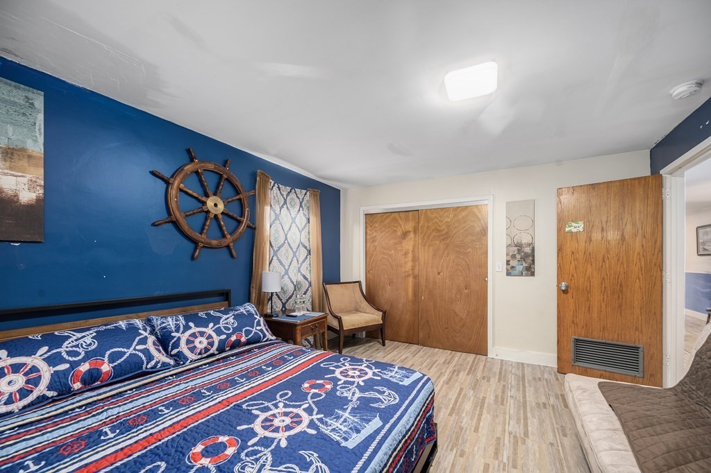 67 Ridge Street Providence, RI 02909 - Photo 22 of 42 a bed room with a bed and a couch
