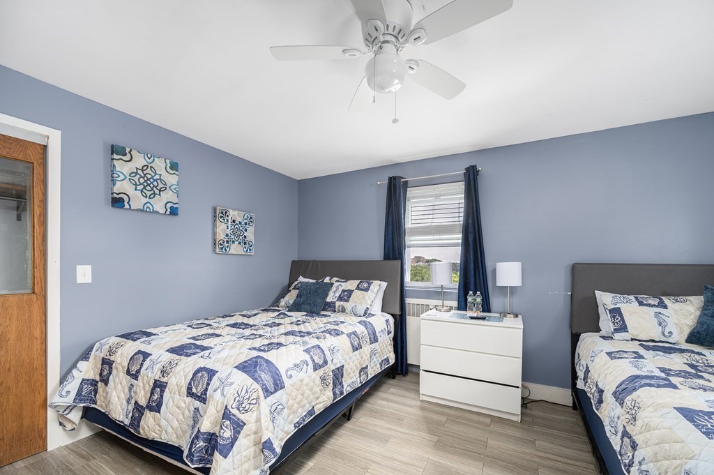 67 Ridge Street Providence, RI 02909 - Photo 24 of 42 a bedroom with a large bed and a window