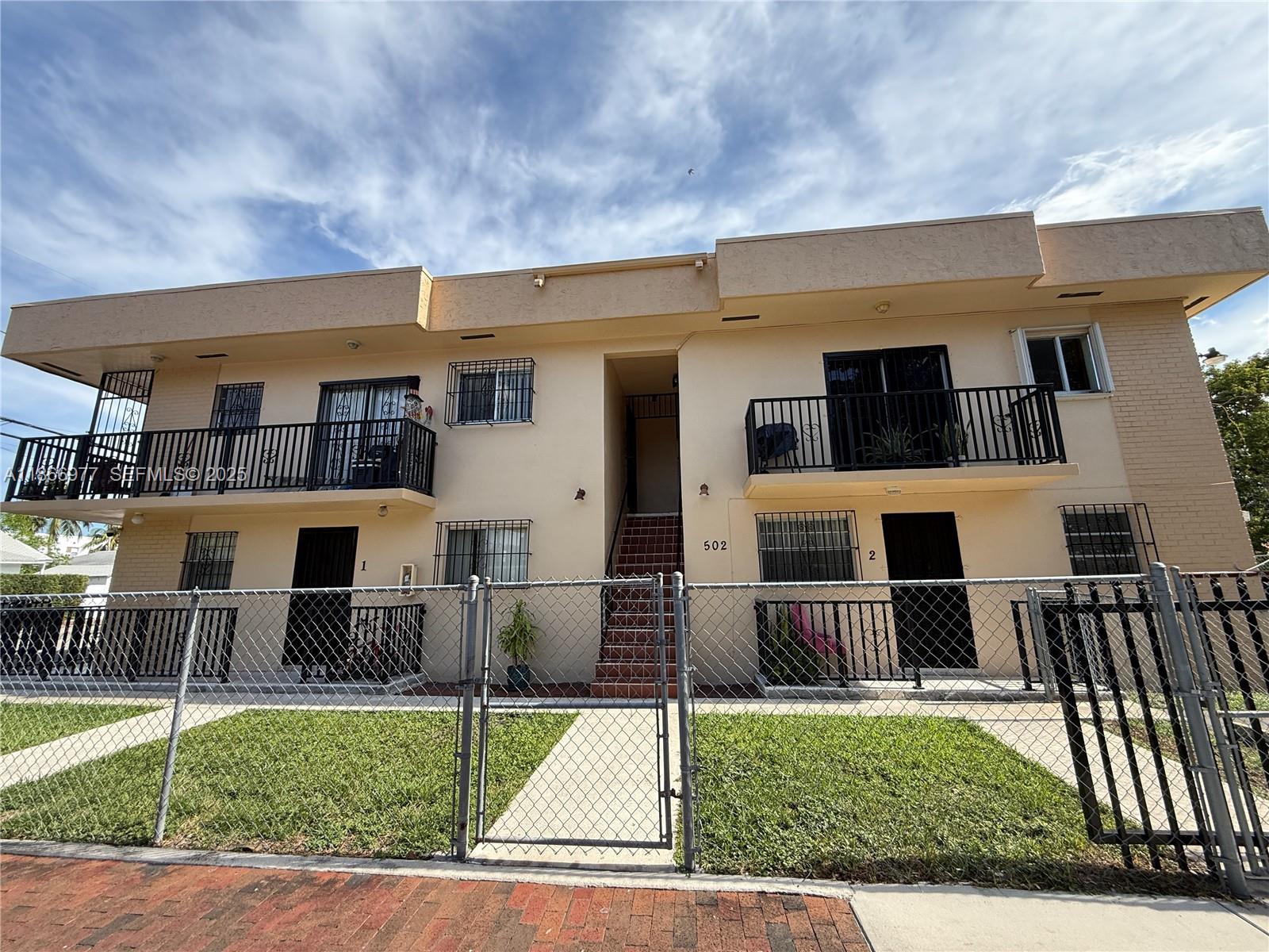 502 Southwest 13th Avenue Miami, FL 33135 - Photo 16 of 48 a view of a house with backyard porch and sitting area