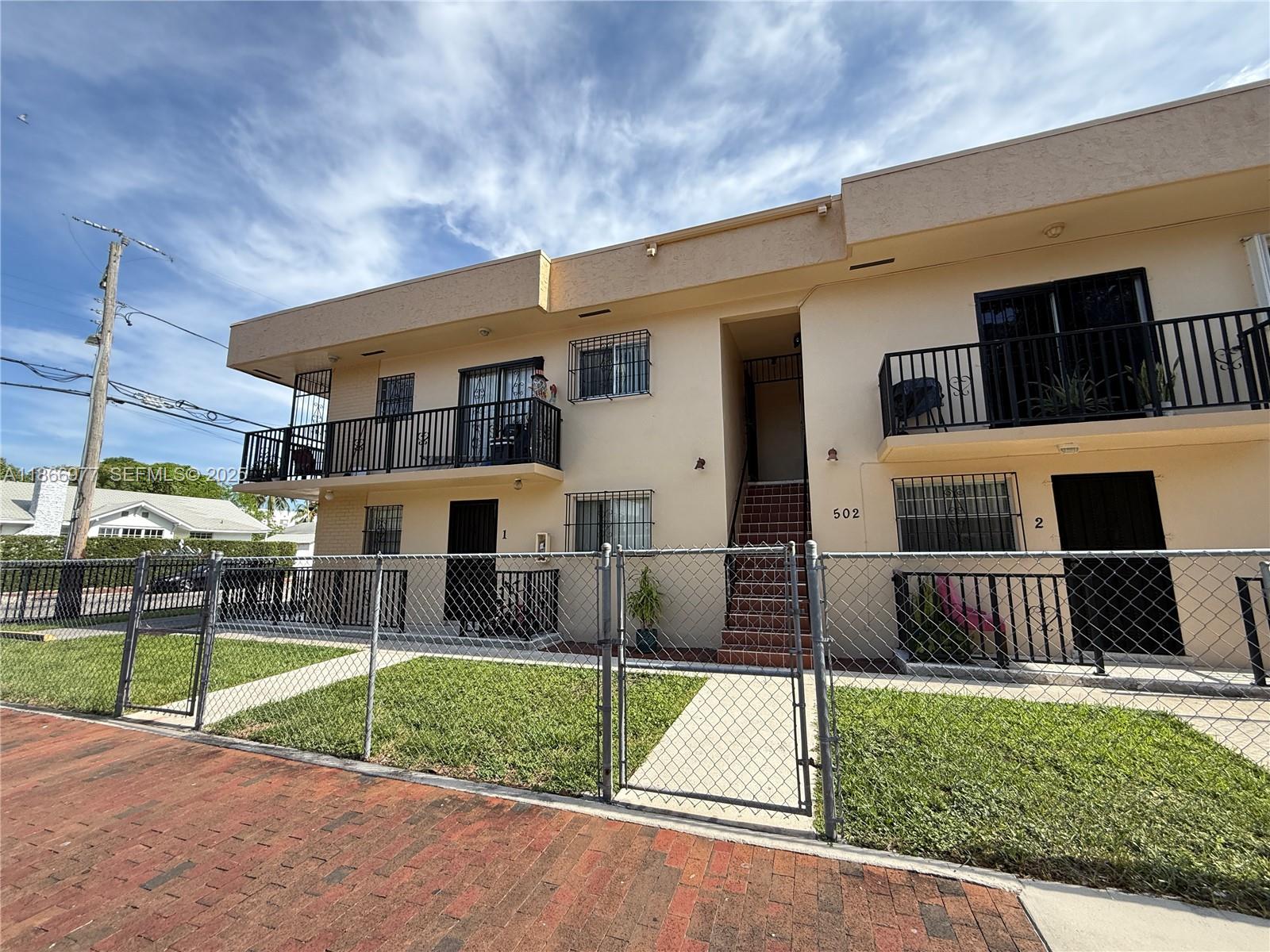 502 Southwest 13th Avenue Miami, FL 33135 - Photo 17 of 48 a view of a house with a yard and porch