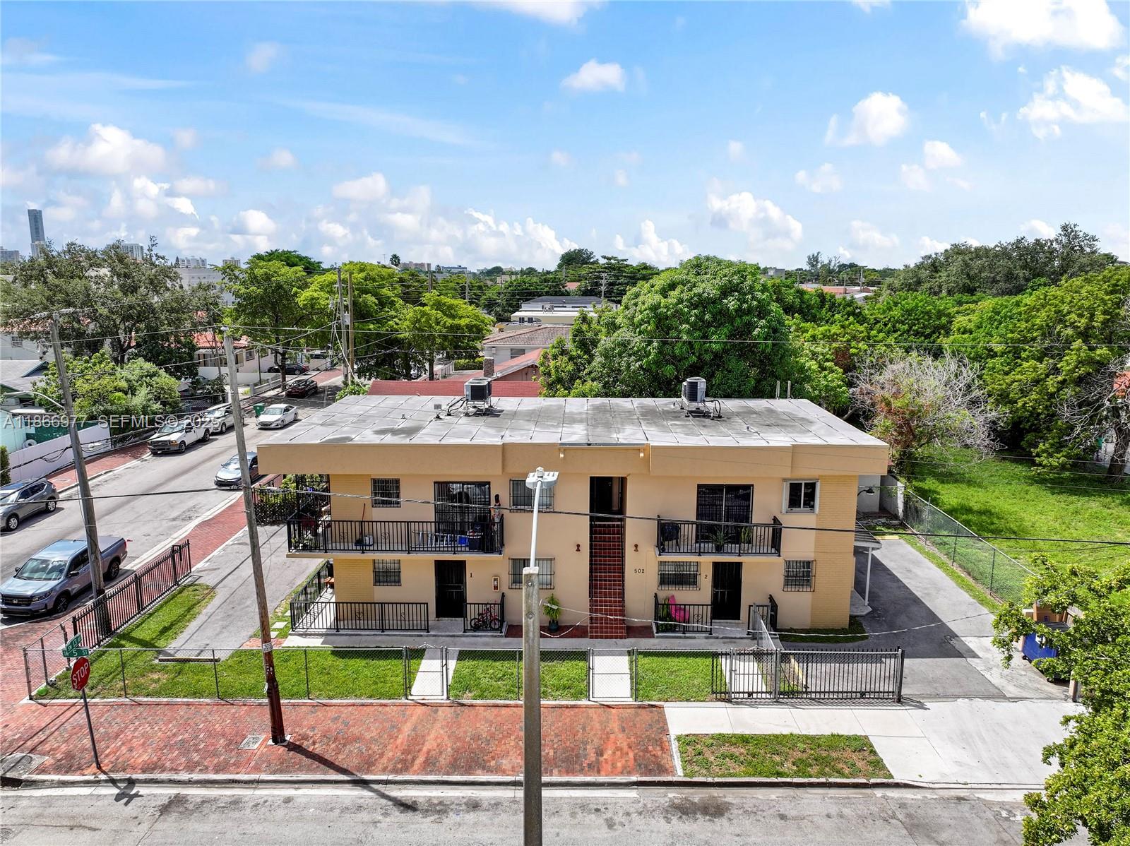 502 Southwest 13th Avenue Miami, FL 33135 - Photo 2 of 48 a view of multiple houses with a yard