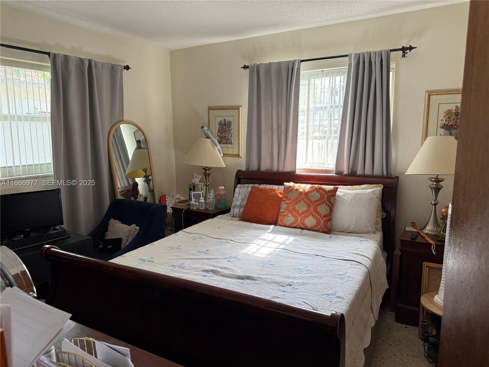 502 Southwest 13th Avenue Miami, FL 33135 - Photo 21 of 48 a bedroom with bed and window