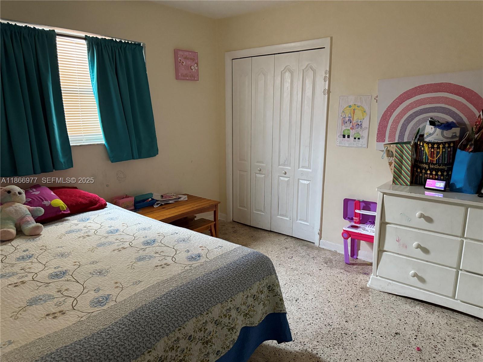 502 Southwest 13th Avenue Miami, FL 33135 - Photo 26 of 48 a bedroom with a bed and a dresser