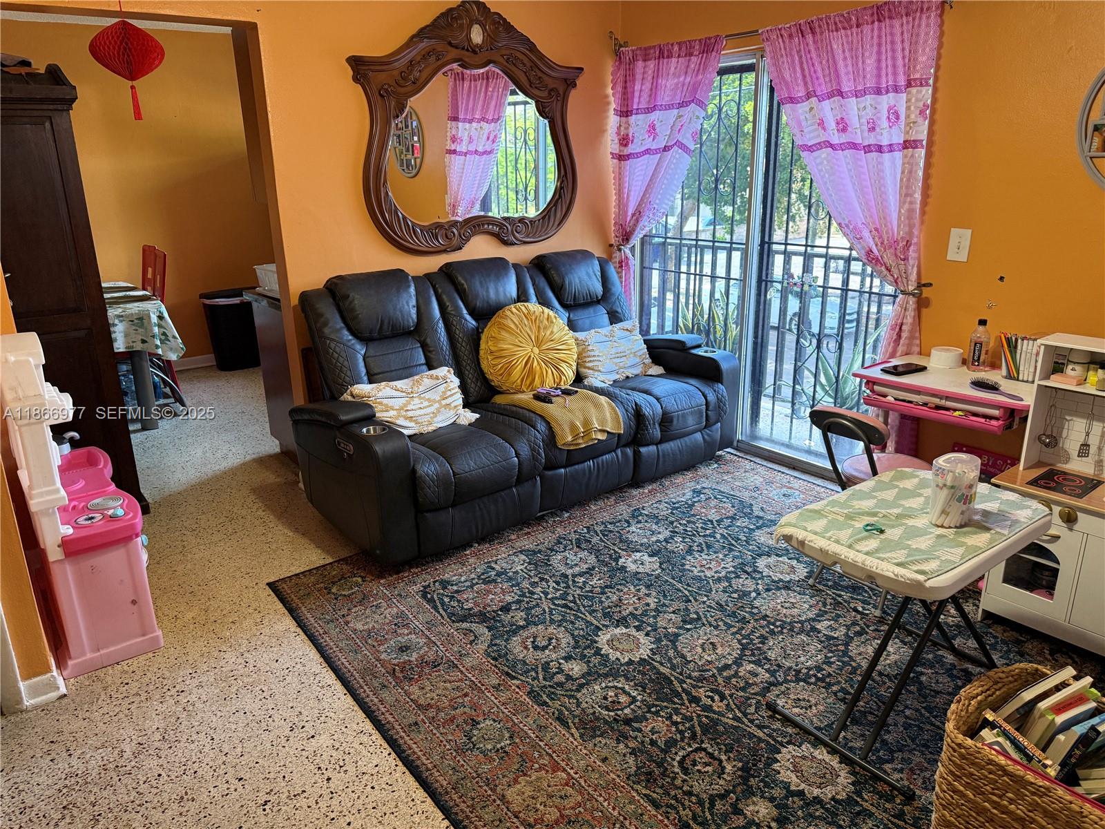 502 Southwest 13th Avenue Miami, FL 33135 - Photo 43 of 48 a living room with furniture a rug and a lamp