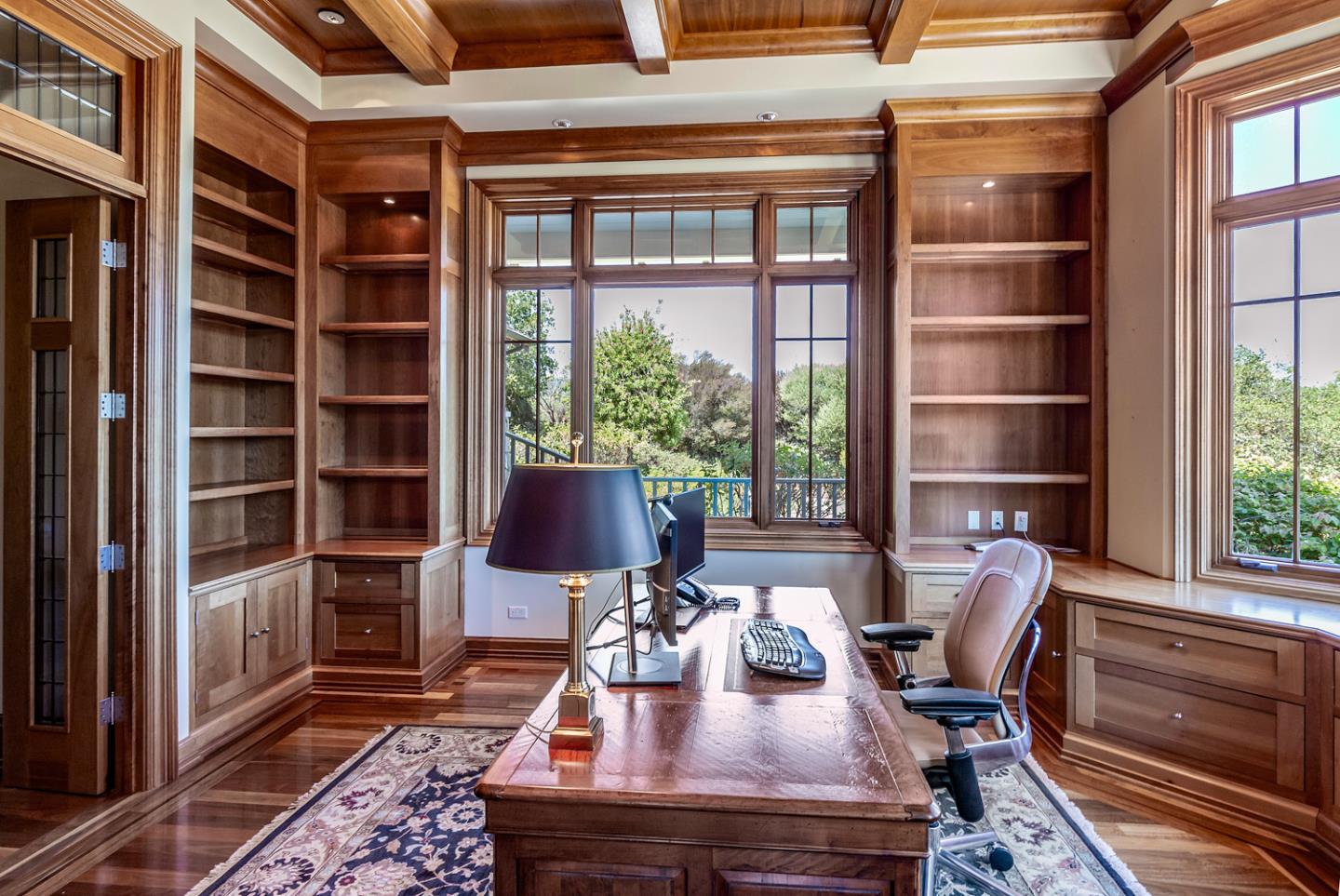 1 Redberry Ridge Portola Valley, CA 94028 - Photo 16 of 59 a view of a workspace with furniture and a window