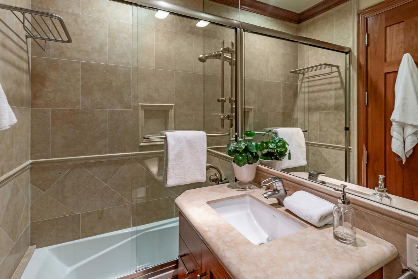 1 Redberry Ridge Portola Valley, CA 94028 - Photo 18 of 59 a bathroom with a sink and a mirror
