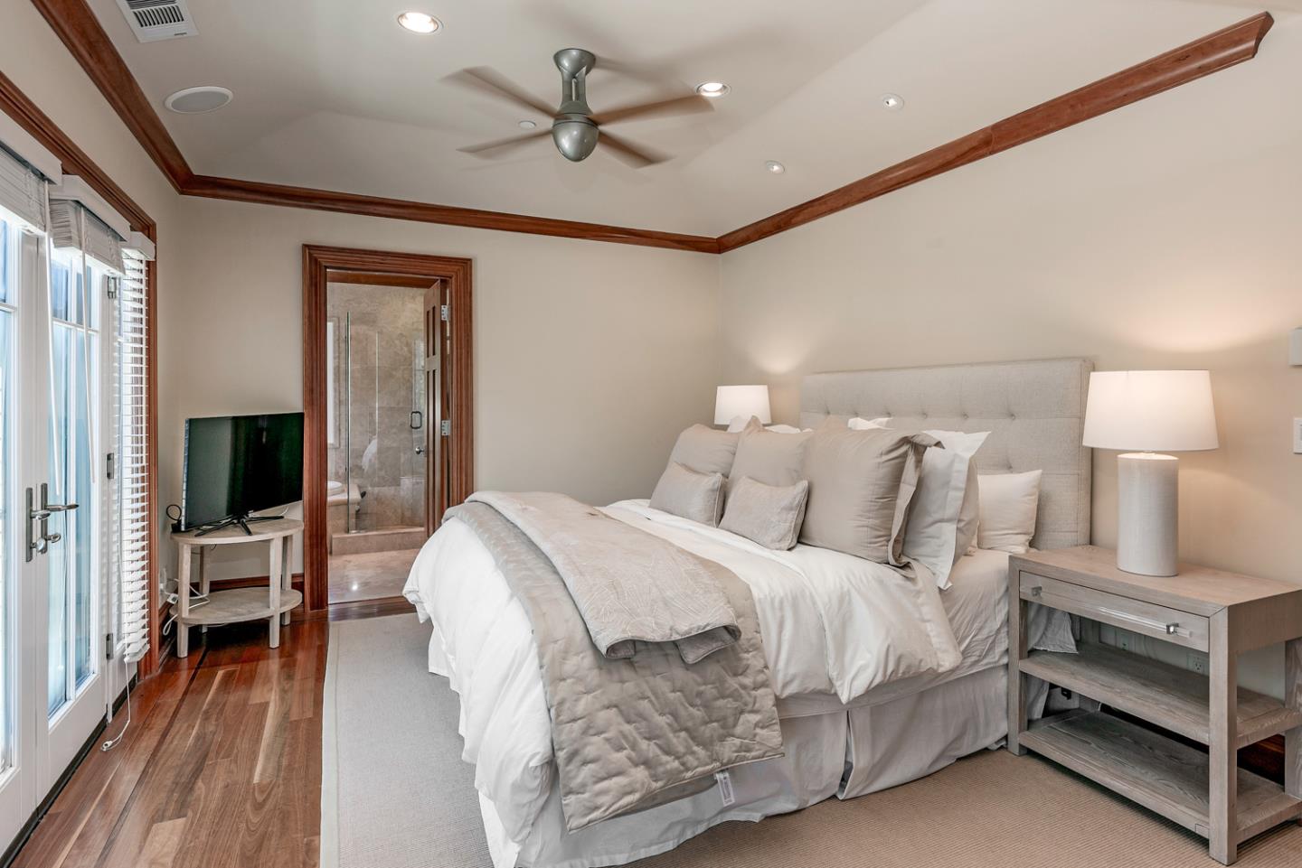 1 Redberry Ridge Portola Valley, CA 94028 - Photo 25 of 59 a bedroom with a bed and a flat screen tv