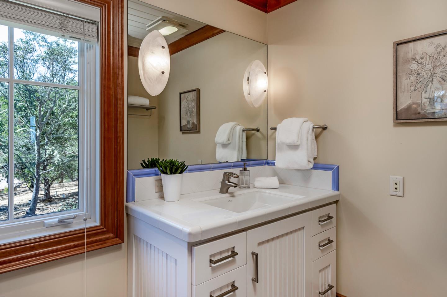 1 Redberry Ridge Portola Valley, CA 94028 - Photo 31 of 59 a bathroom with a sink and a mirror