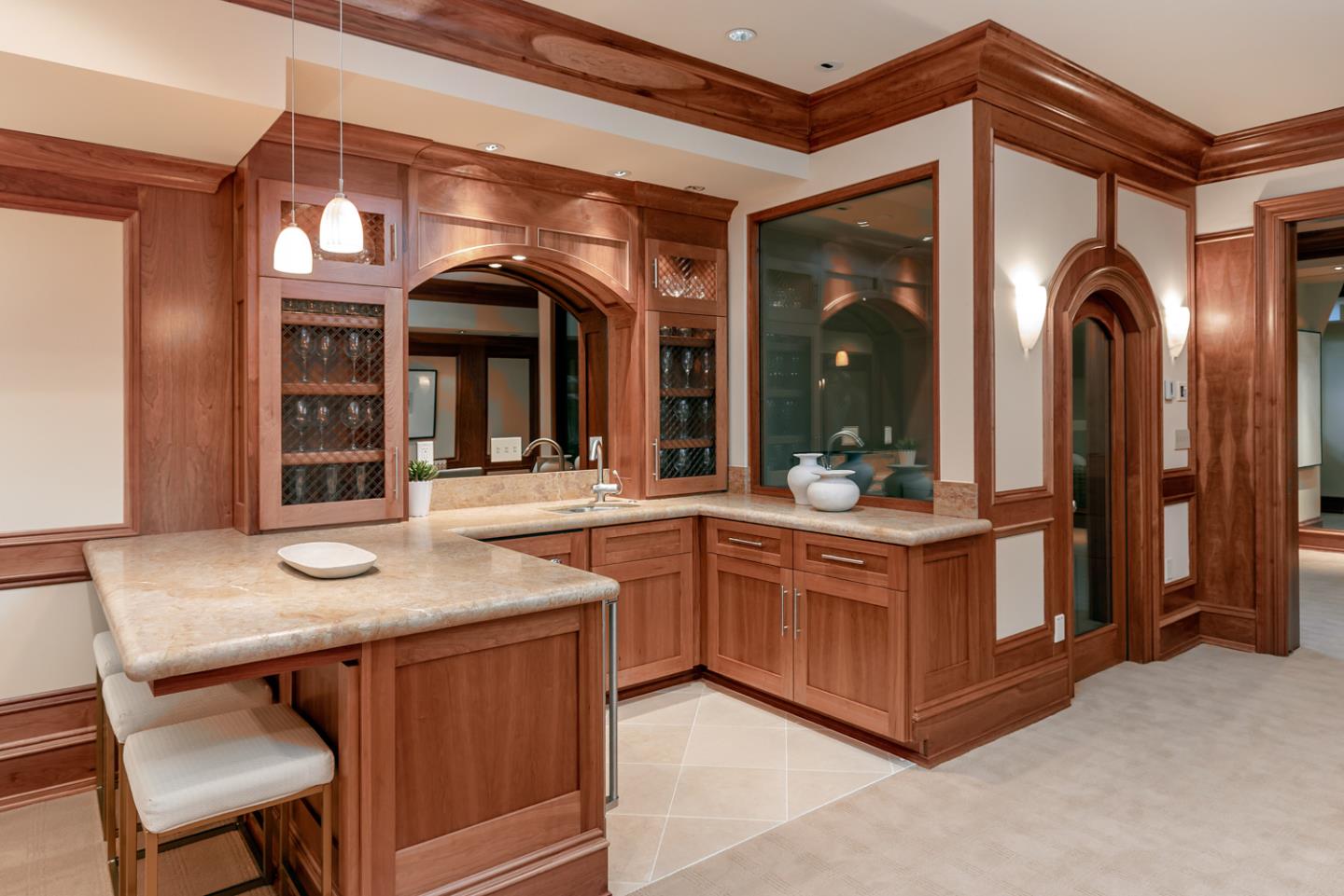 1 Redberry Ridge Portola Valley, CA 94028 - Photo 35 of 59 a kitchen with stainless steel appliances granite countertop a sink and cabinets