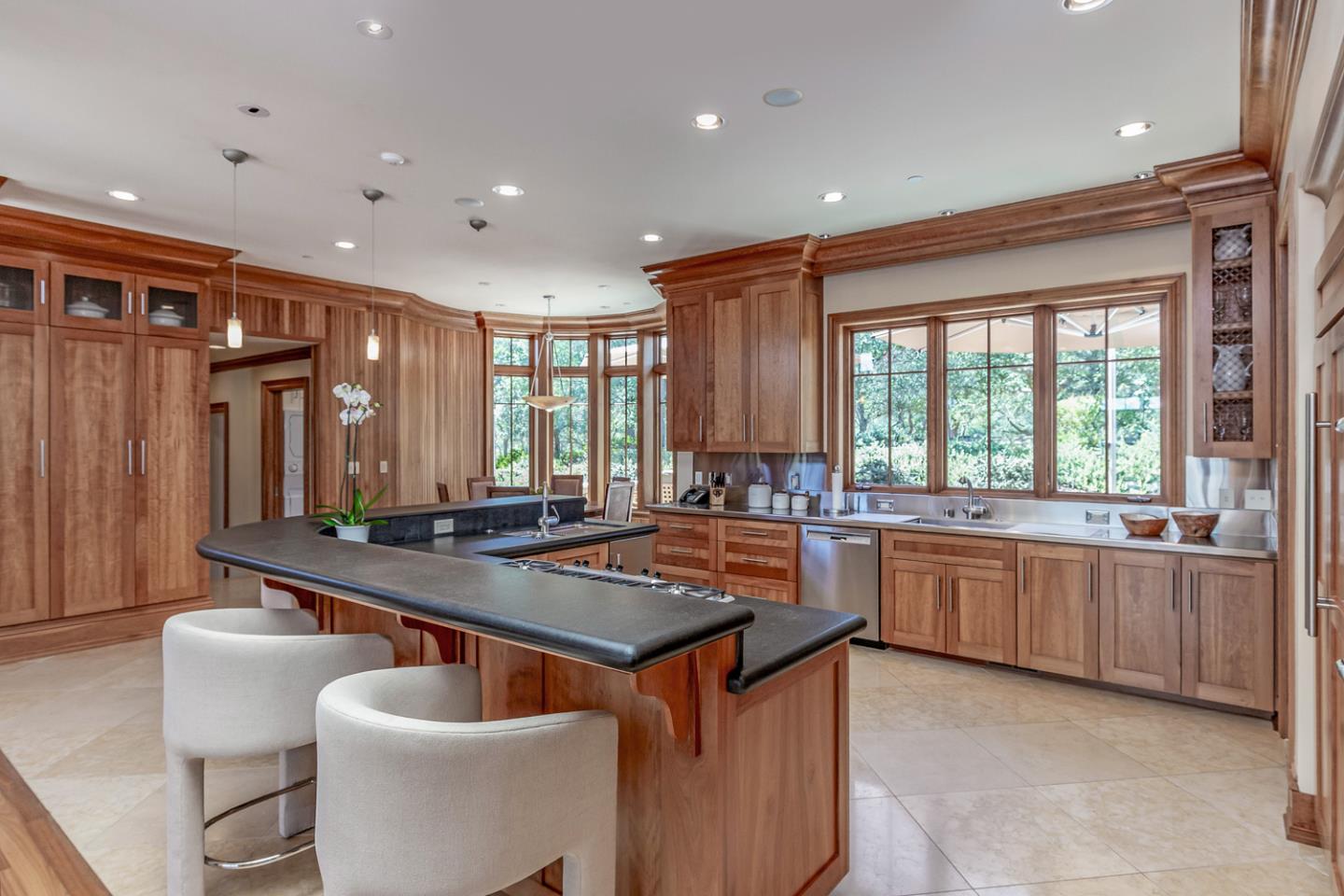 1 Redberry Ridge Portola Valley, CA 94028 - Photo 9 of 59 a kitchen with sink a stove and chairs