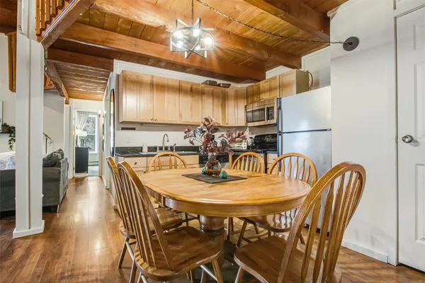 a view of a dining room with furniture