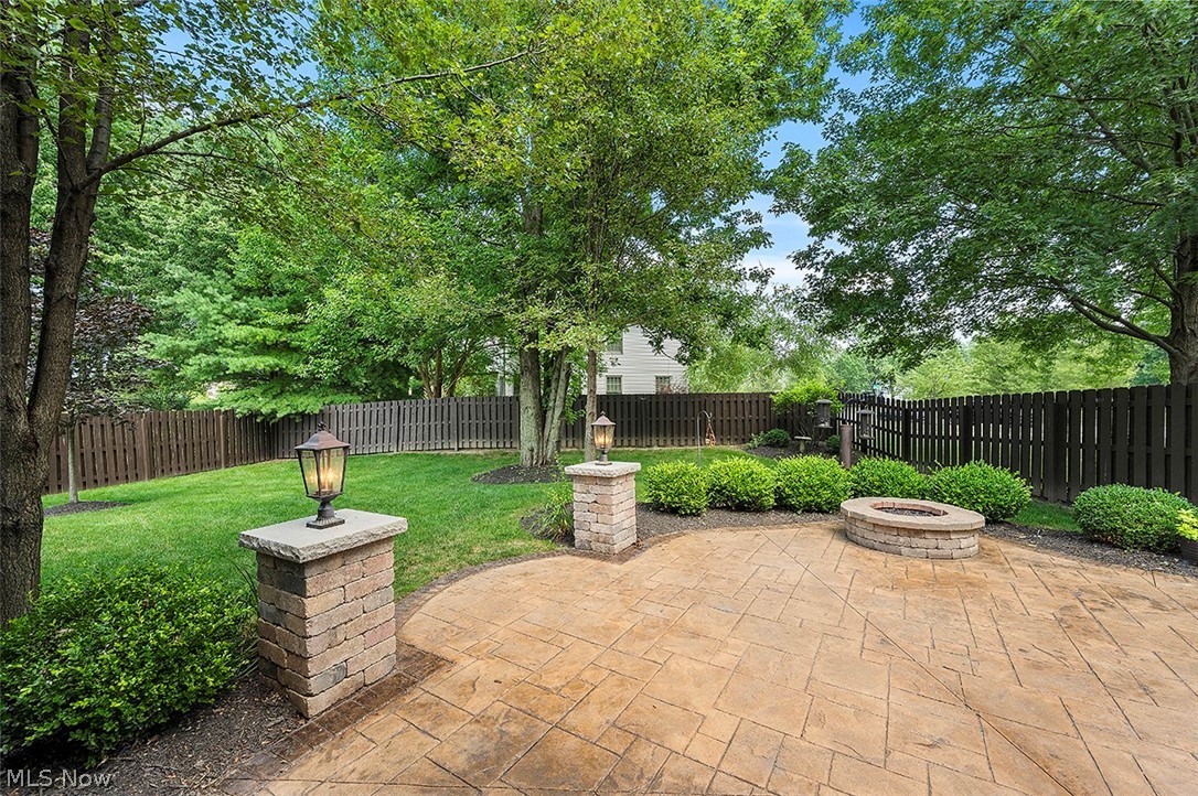 4501 Jaycox Road Avon, OH 44011 - Photo 6 of 32 large private fenced in backyard which boasts spacious patio with gas firepit.