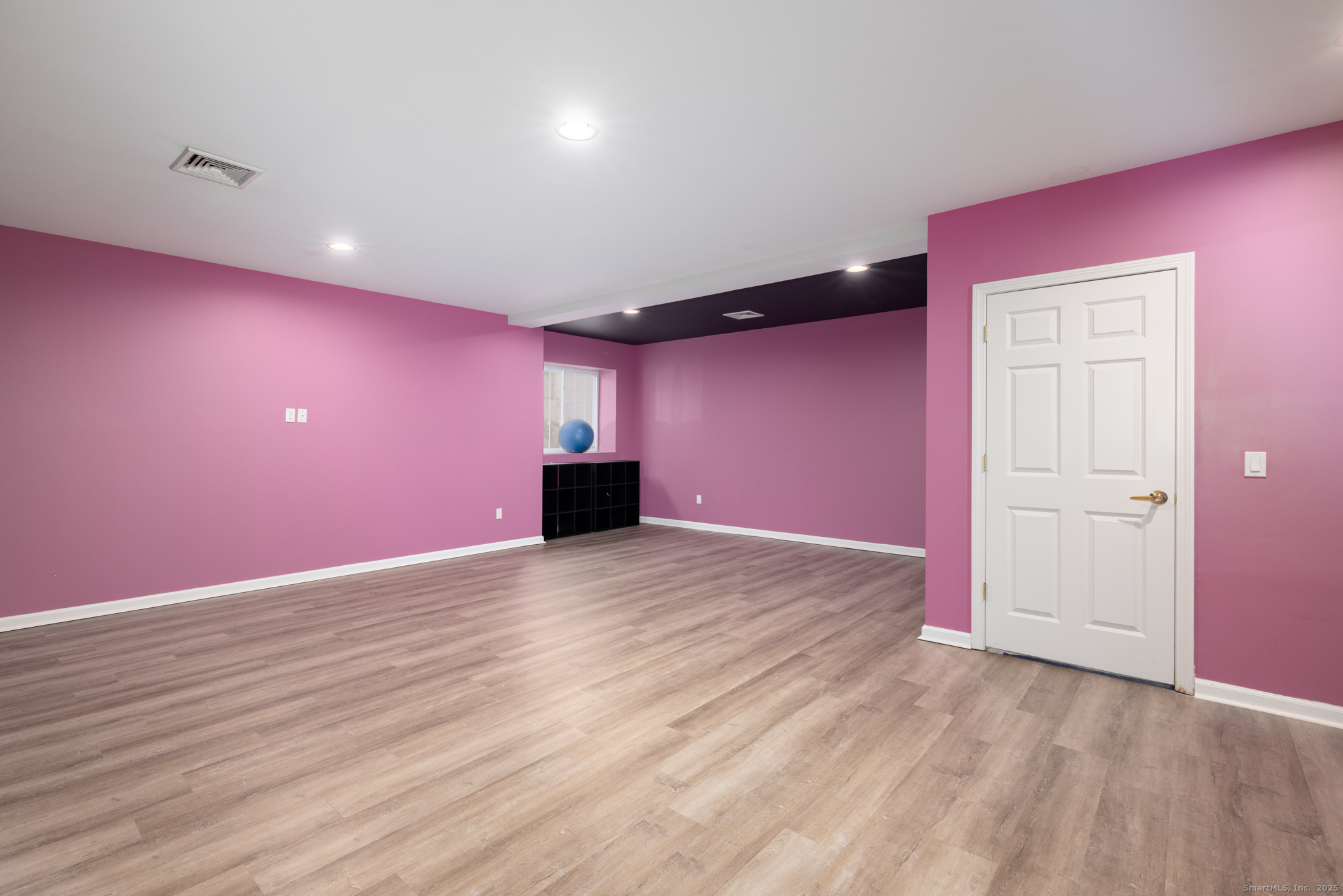 49 Park Pl Circle, Unit 49 West Hartford, CT 06110 - Photo 26 of 33 a view of empty room with wooden floor
