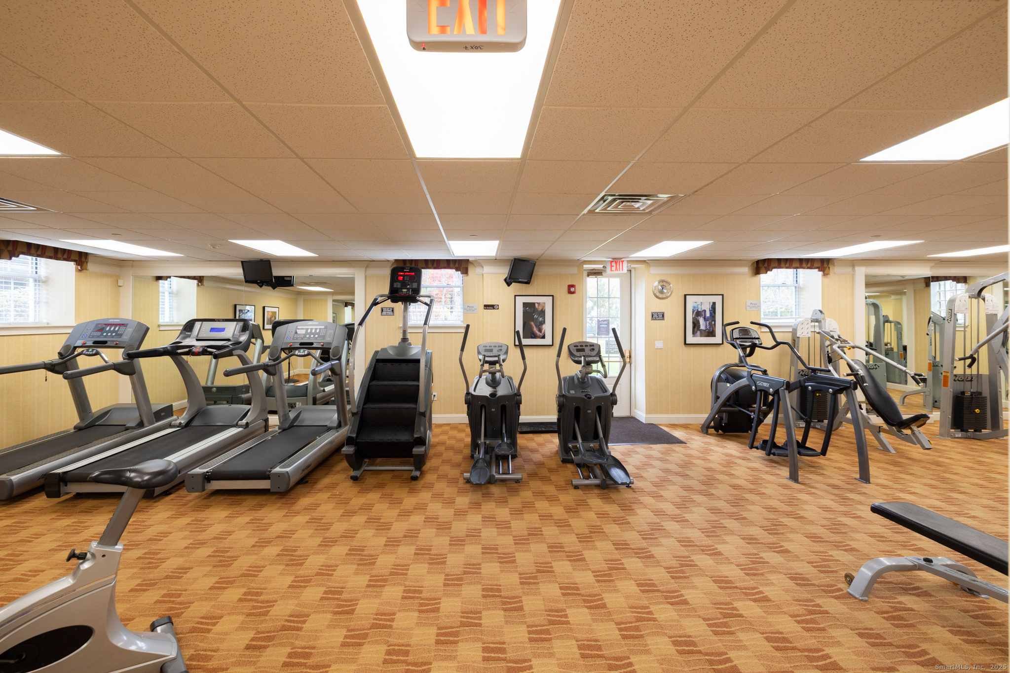 49 Park Pl Circle, Unit 49 West Hartford, CT 06110 - Photo 33 of 33 a view of a room with gym equipment