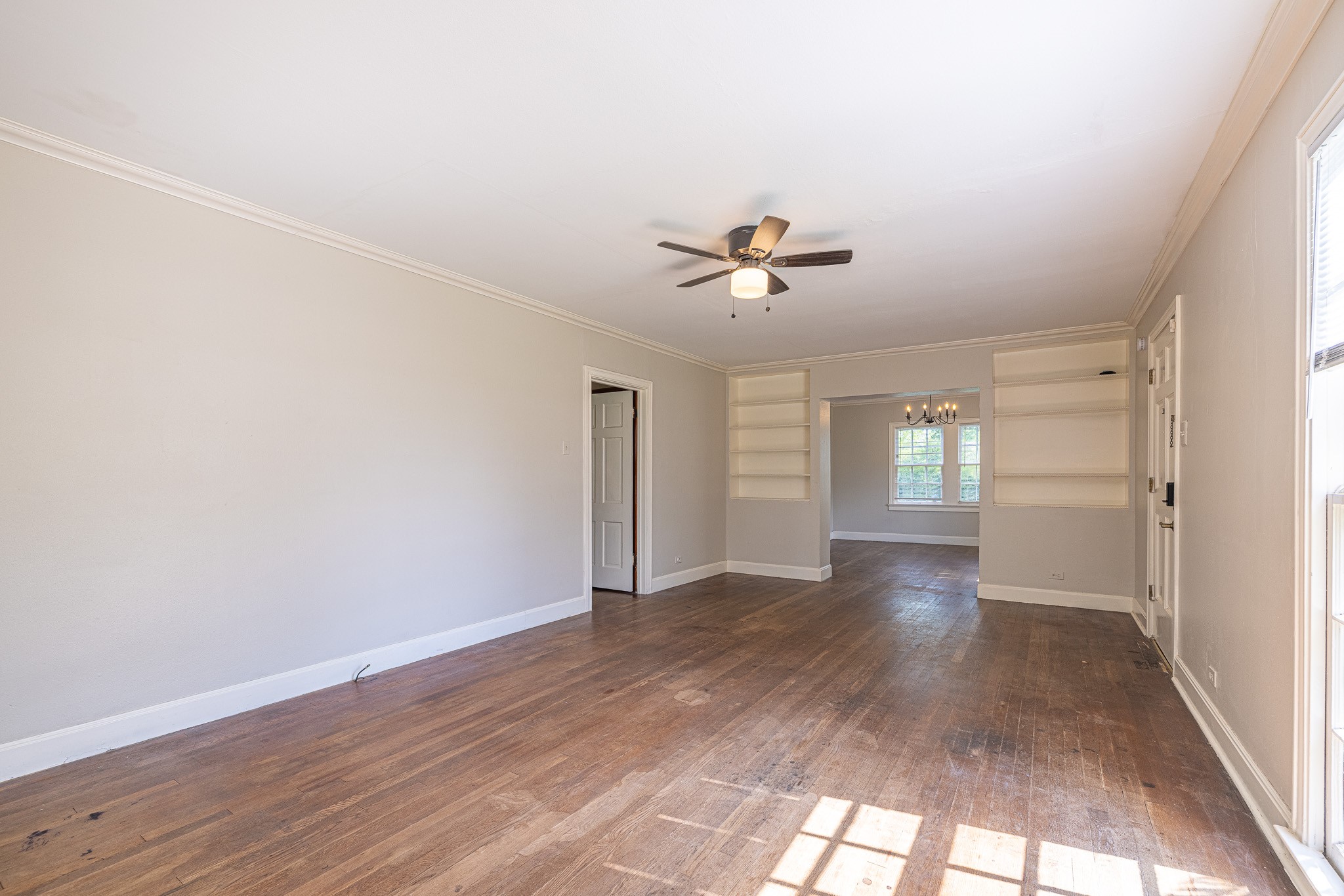 8548 Findlay Street Houston, TX 77017 - Photo 9 of 50 wooden floor in an empty room with a window