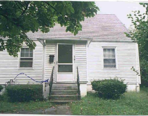 361 Funston Avenue Bridgeport, CT 06606 - Photo 1 of 1 a front view of a house with a yard and garage