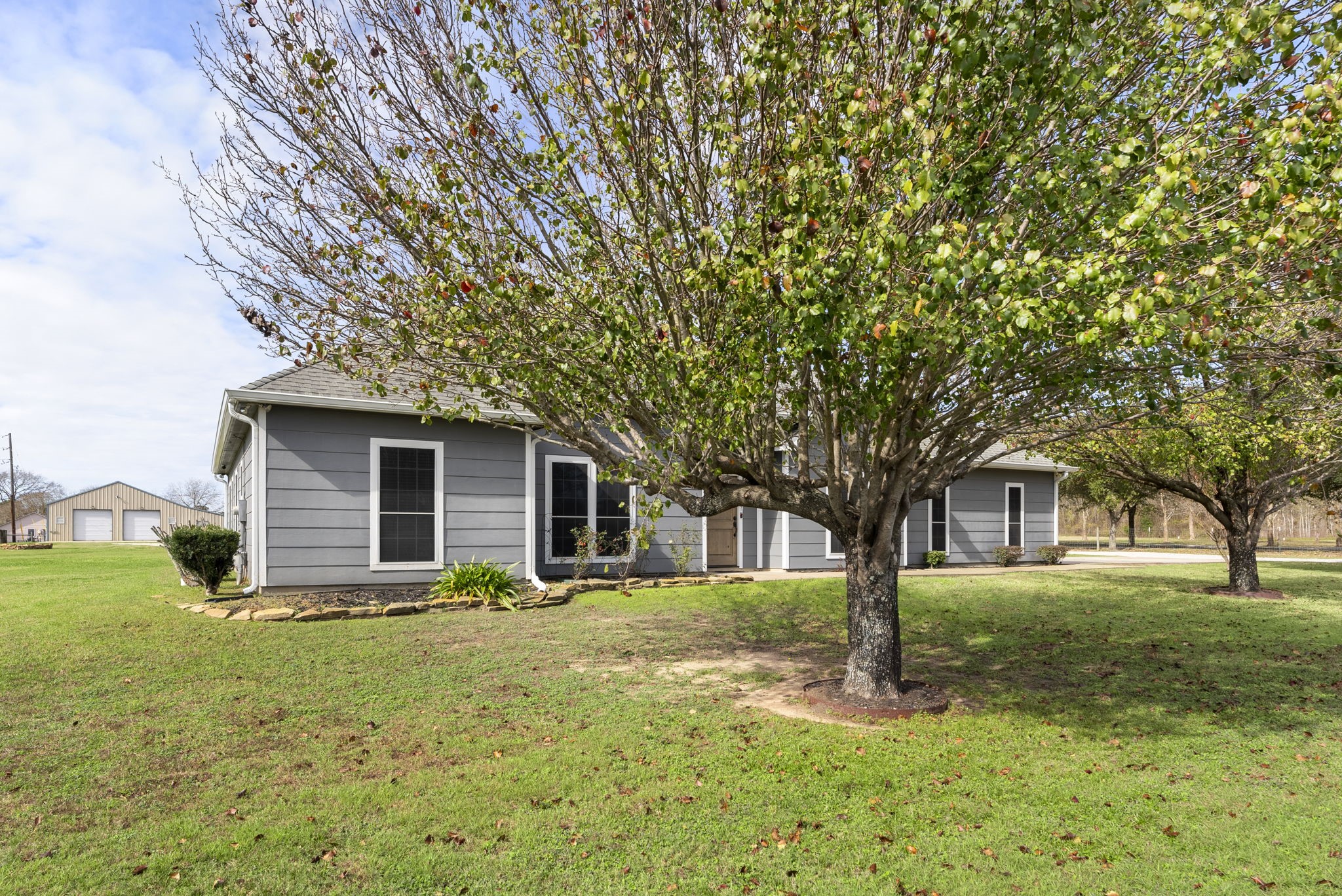 13942 Longstreet Road Willis, TX 77318 - Photo 3 of 46 a front view of house with yard and trees