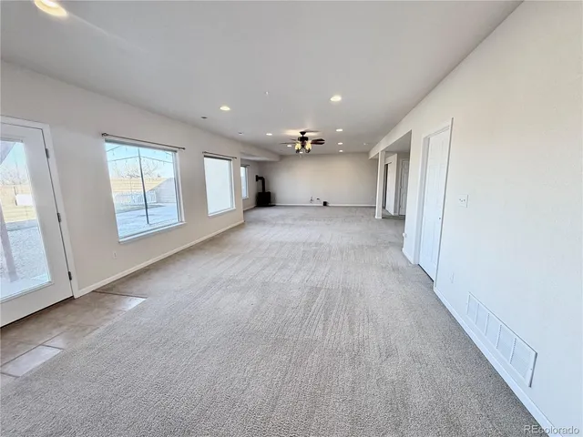 a view of a livingroom with a staircase