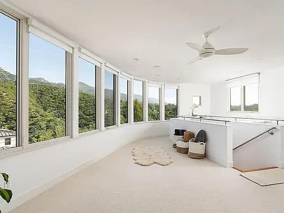 331 Sherman Road Santa Barbara, CA 93103 - Photo 14 of 18 a living room with furniture and a large window