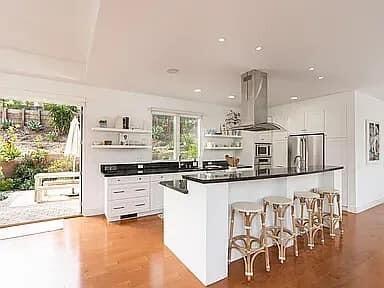 331 Sherman Road Santa Barbara, CA 93103 - Photo 10 of 18 a kitchen with stainless steel appliances a stove top oven and a refrigerator