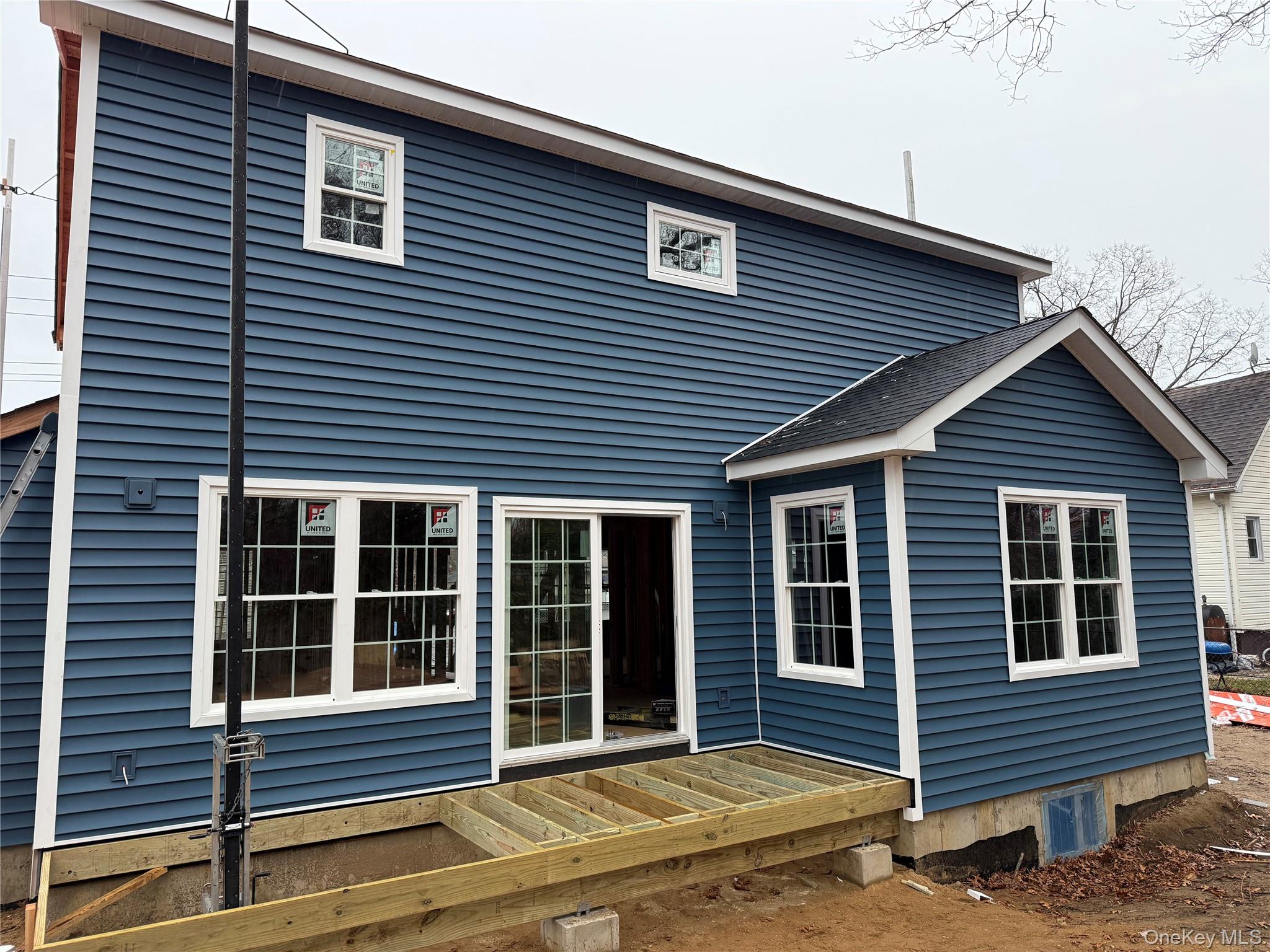 494 Islip Avenue Islip, NY 11751 - Photo 22 of 22 a front view of a house with a yard