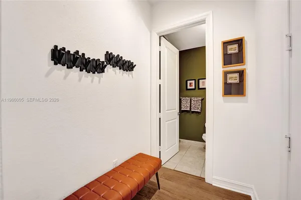 a hallway with a bench