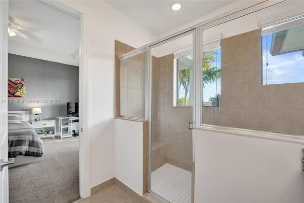 a view of a living room and floor to ceiling window