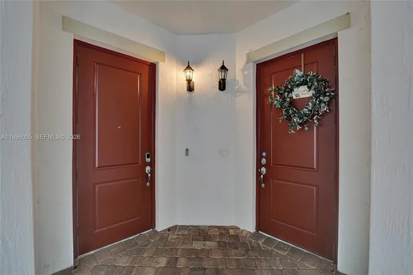 a view of a hallway with closet