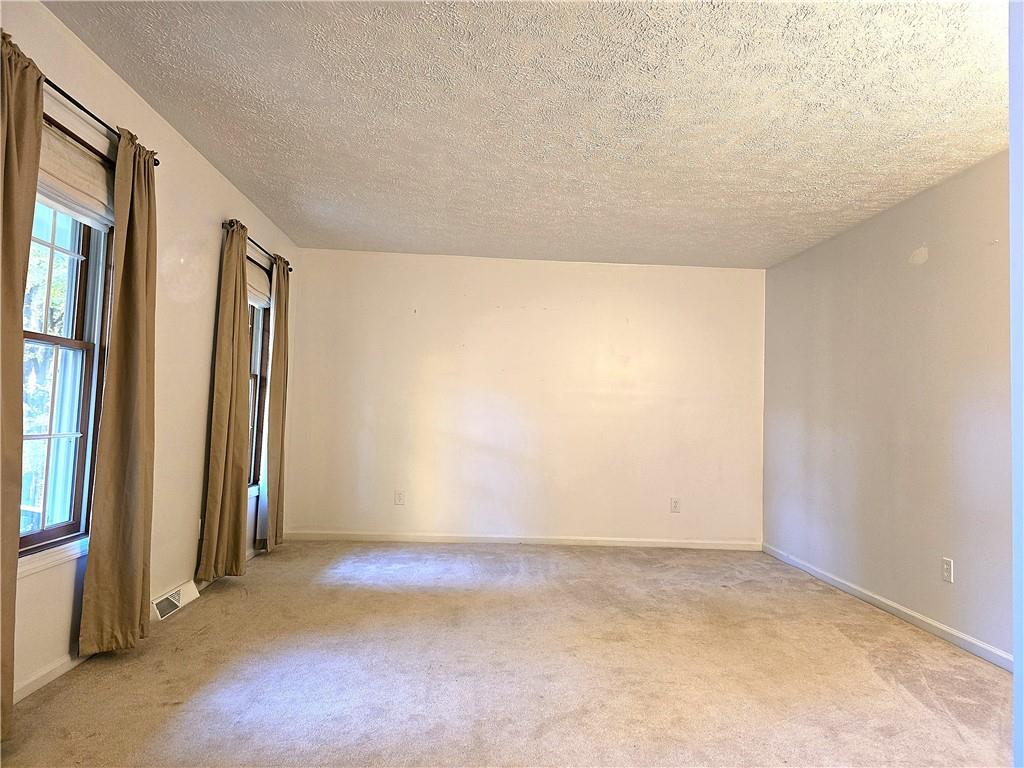 316 Stein Road Chicora, PA 16025 - Photo 8 of 41 an empty room with windows