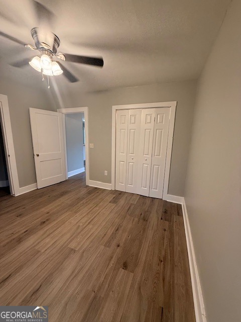 443 Stewart Street Southwest Pelham, GA 31779 - Photo 13 of 19 wooden floor in an empty room with a window