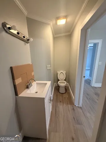 a bathroom with a sink and a toilet