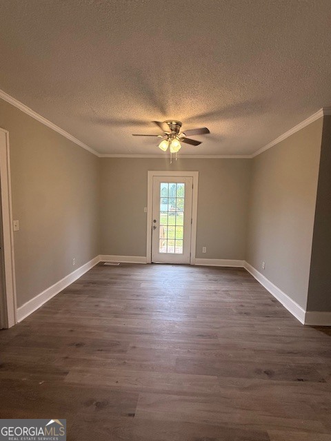 443 Stewart Street Southwest Pelham, GA 31779 - Photo 10 of 19 a view of an empty room with wooden floor and a window