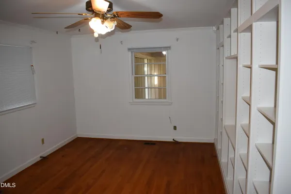 a view of a room with rack on the wall