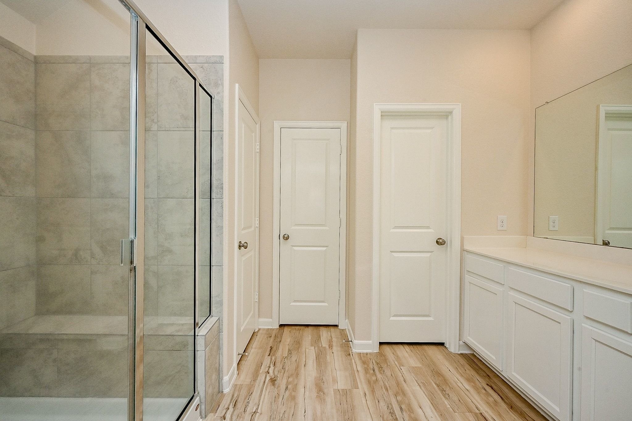 3715 Homestead Ridge Lane Richmond, TX 77406 - Photo 15 of 20 a view of a hallway with wooden floor