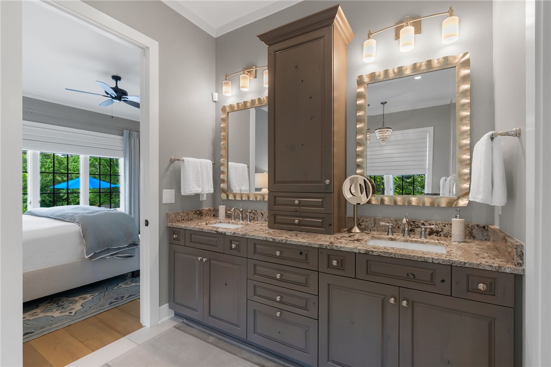 119 Drewberry Lane Sunset, SC 29685 - Photo 16 of 42 This bathroom features a double vanity with granite counters and stylish mirrors, providing a refined space.